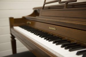 A picture of the wooden Baldwin Piano